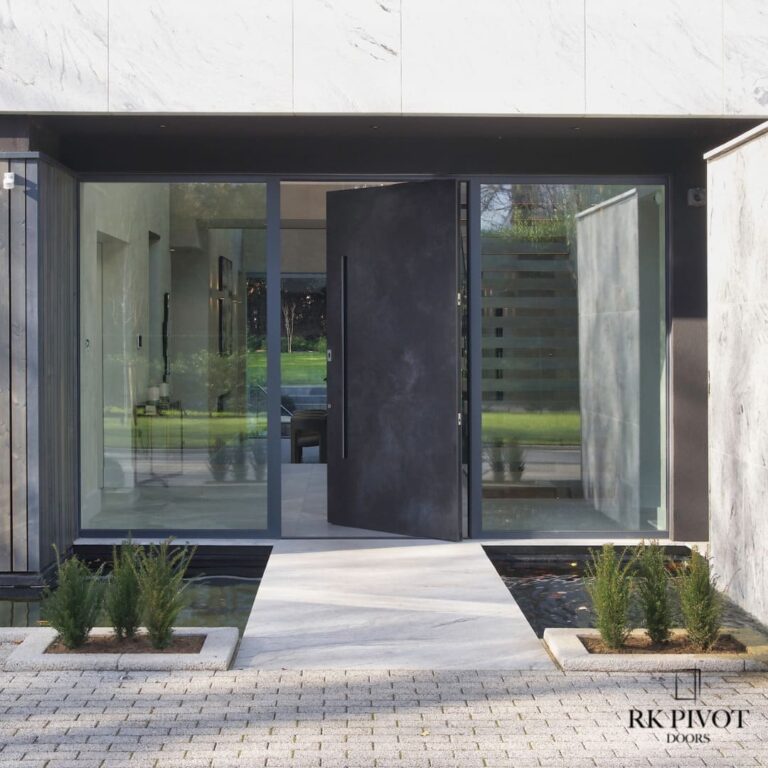 RK Pivot nowoczesne drzwi zewnętrzne pivot - drzwi Ossido Nero ceramiczne - spiekany kamień z wypuszczaną klamką